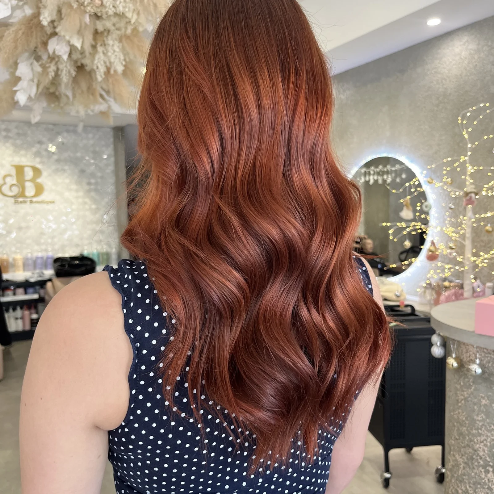 Long copper-auburn hair with balayage highlights
